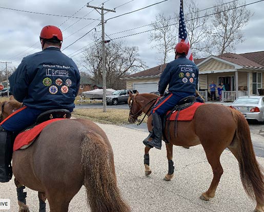 Veterans on horses in a parade